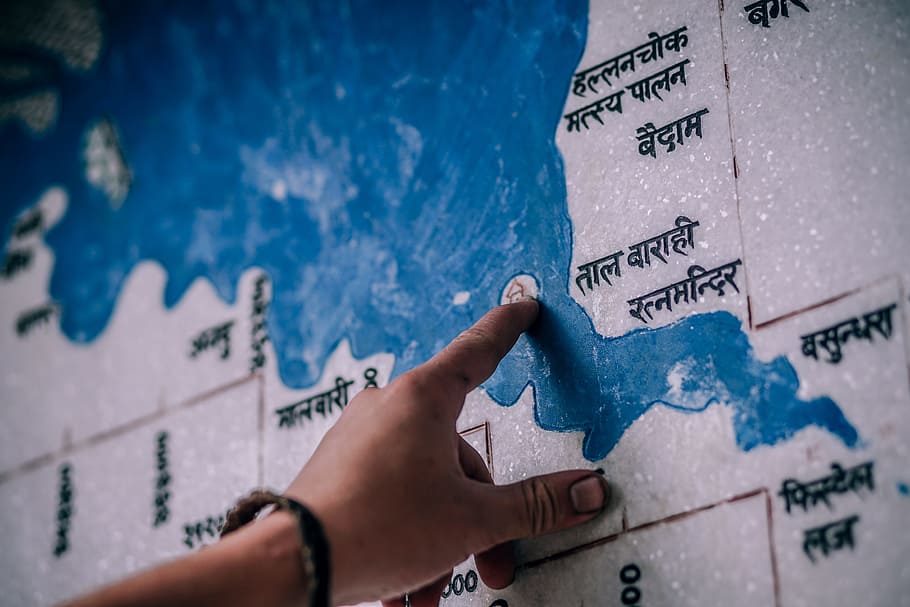 person pointing map, blue map, Next, nepal, hand, travel, cartography HD wallpaper