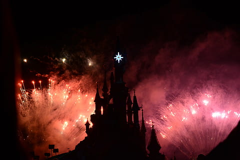 silhouette castle with lighted fireworks at night, disney, paris HD wallpaper