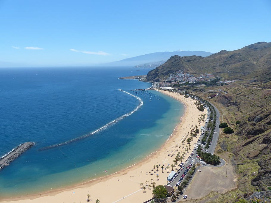 aerial view of shoreline beside mountain, beach, water, sea, coast