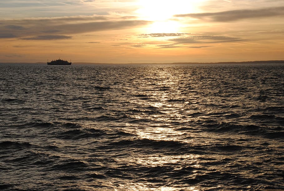 sea, backlight, waves, sunset, sky, water, beauty in nature HD wallpaper