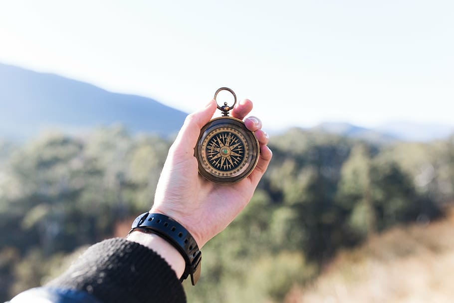 person showing brown compass, adventure, hand, macro, mountain HD wallpaper