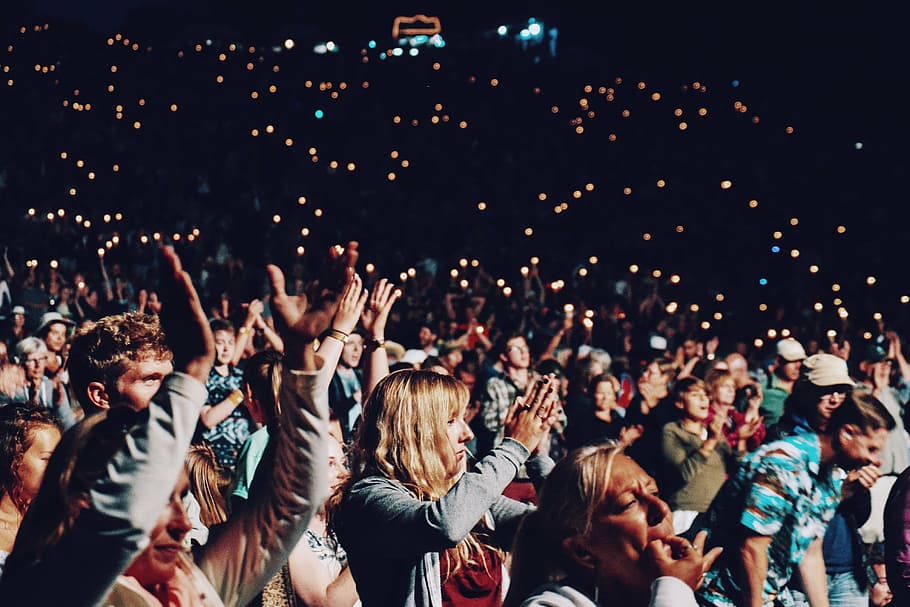 people raising their hands, group, bokeh, lights, crowd, clapping
