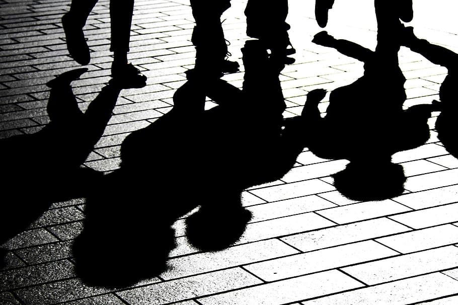 silhouette of group of people on brick floor, shadows, reflected HD wallpaper