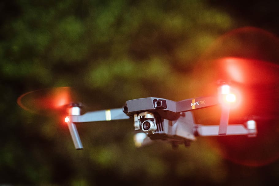 selective photography of drone copter, flying black drone during night HD wallpaper