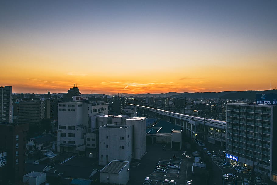 sunset, aeiral photo of city during golden hour, building, sunrise HD wallpaper
