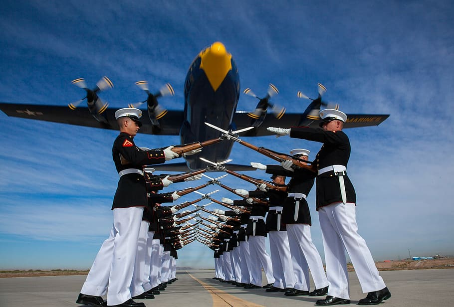 military salute and black airplane, silent drill platoon, marine corps