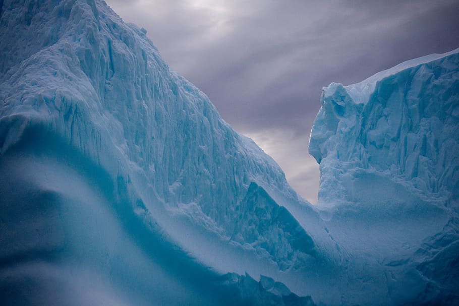 landscape photograph of ice formation, glacier mountain under gray clouds at daytime HD wallpaper