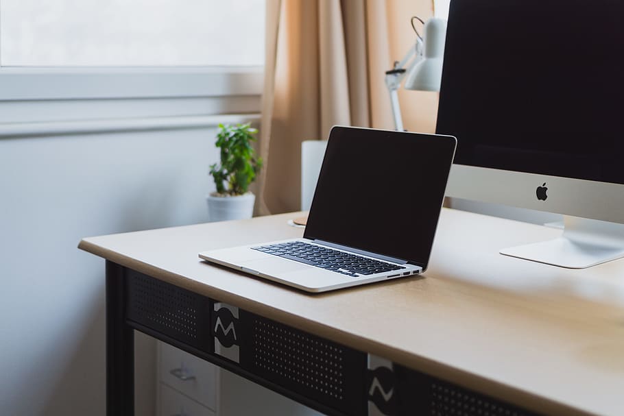 silver laptop on desk beside silver iMac, MacBook on wooden table, HD wallpaper