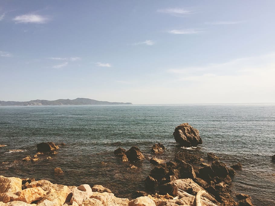 rocks on sea at daytime, ocean, water, wave, nature, coast HD wallpaper