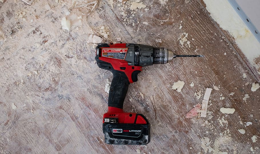 red cordless powerdrill, red and black cordless power drill on brown wood surface HD wallpaper