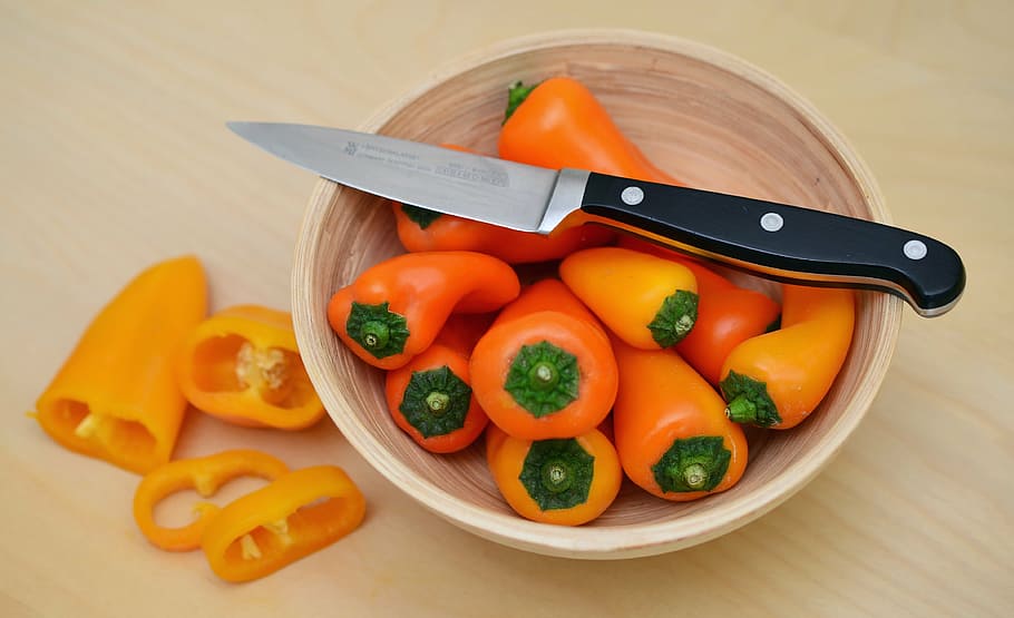 bowl of bell peppers with black handle kitchen knife, paprika, HD wallpaper