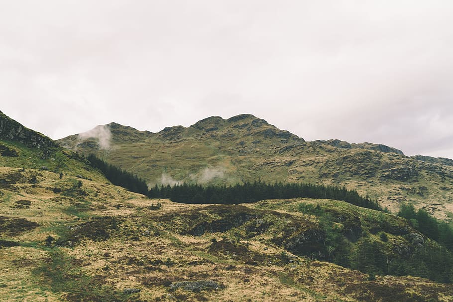 green mountain under cloudy sky, white fogs on mountain, brown mountain HD wallpaper