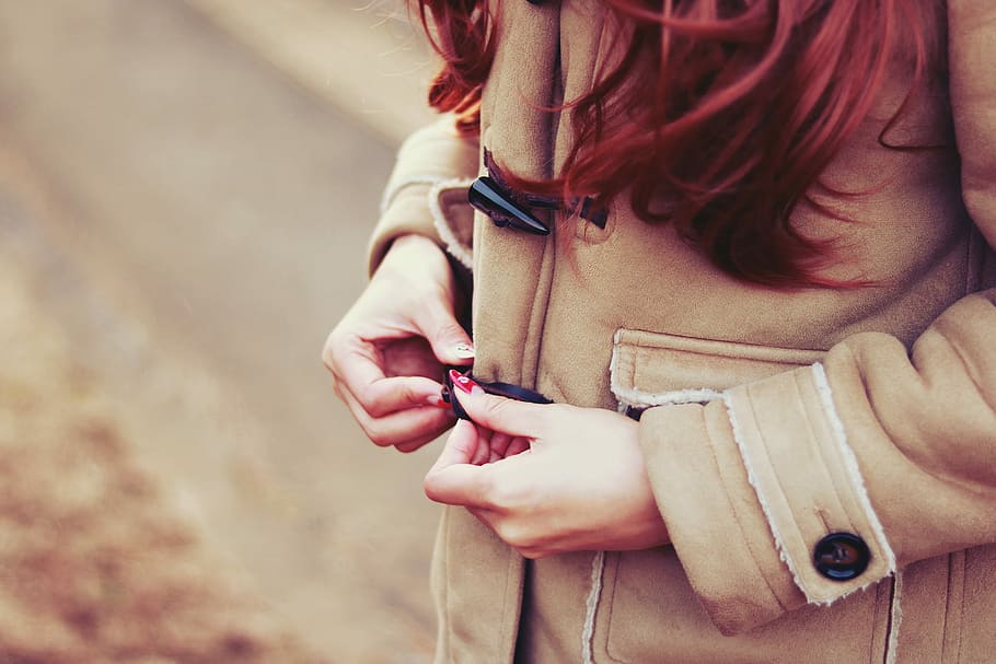 woman in brown toggle coat holding toggle, women, outdoors, one Person HD wallpaper