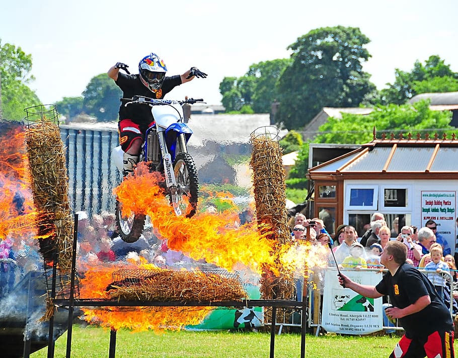 man riding on dirt bike, fire, motorcycles, jump, stunt, dangerous HD wallpaper