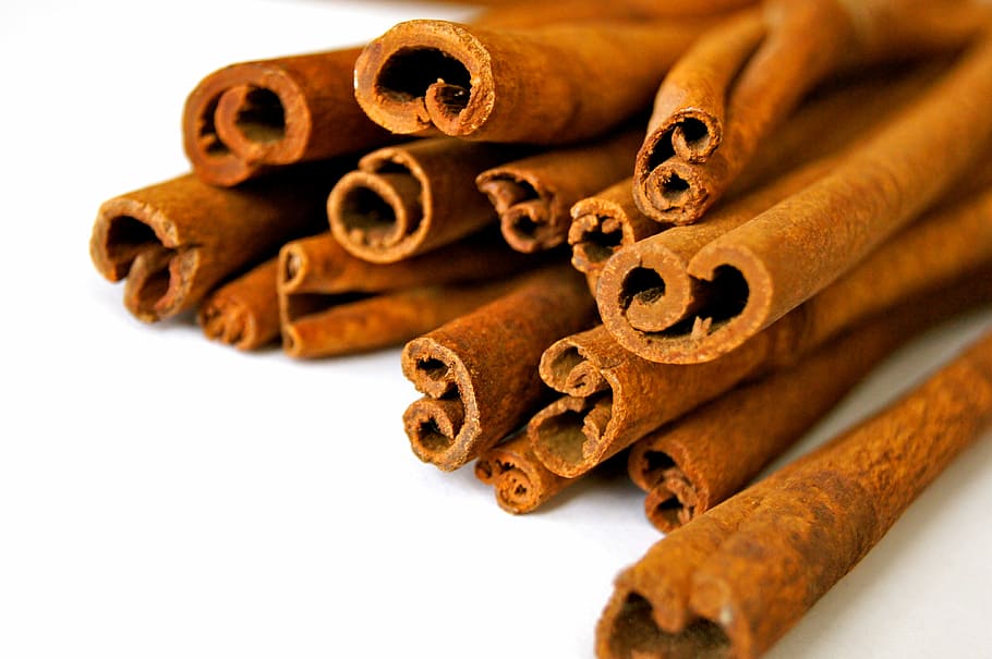 pile of cinnamon roll on white surface, cinnamon stick, rod HD wallpaper