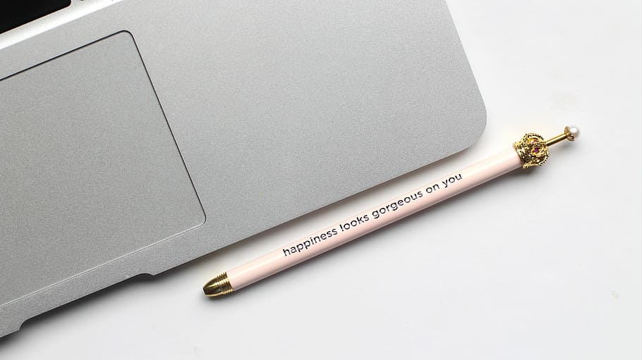 white pen near gray laptop computer, white click pen on table HD wallpaper