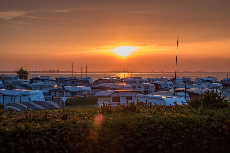 Caravan, Sunset, Sea, Coast, Beach, boats, clouds, water, romance HD wallpaper