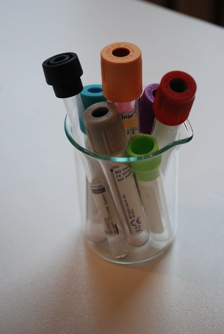 assorted-color glass containers, laboratory, medical, diagnostics