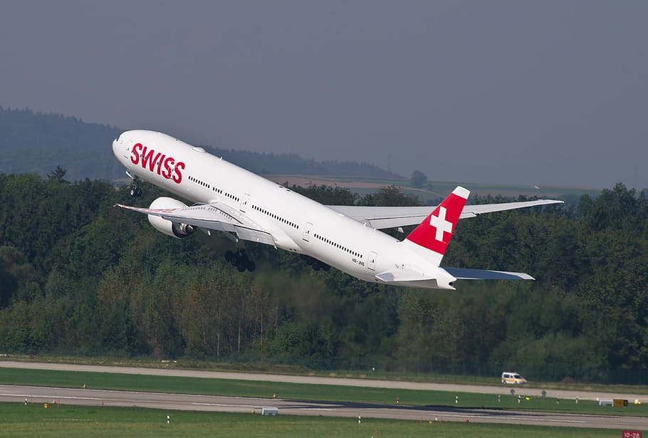 Swiss commercial Airplane departing at daytime, aircraft, boeing 777, HD wallpaper
