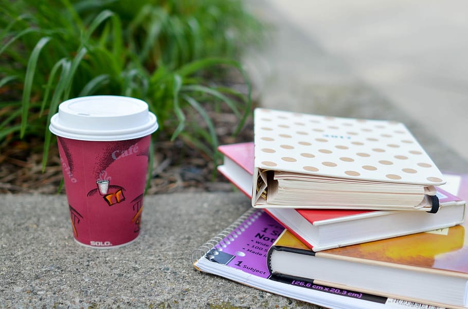 red and white cup beside book, red and white disposable cup beside books and notebook, HD wallpaper