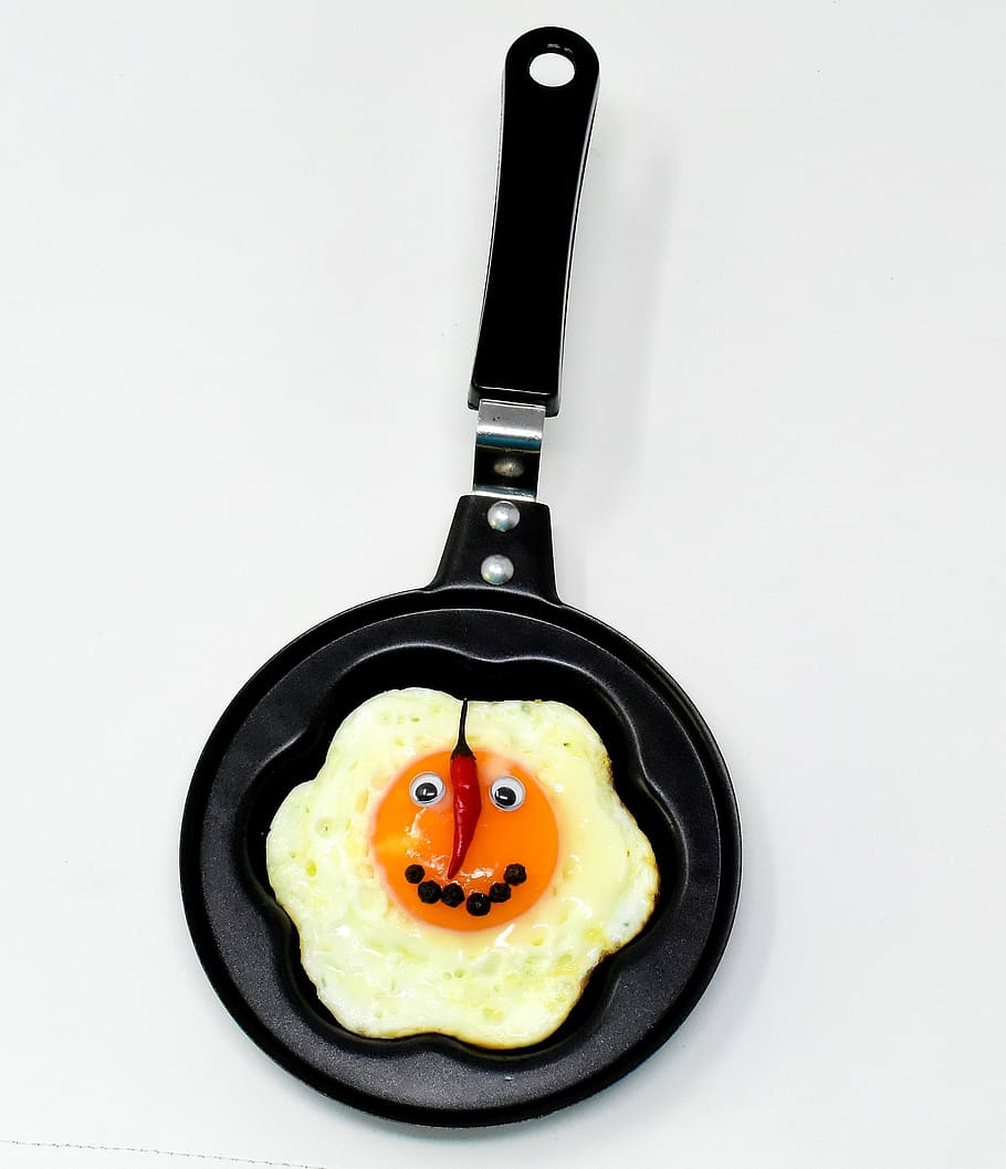 black frying pan on white background, fried, face, funny, pepper HD wallpaper