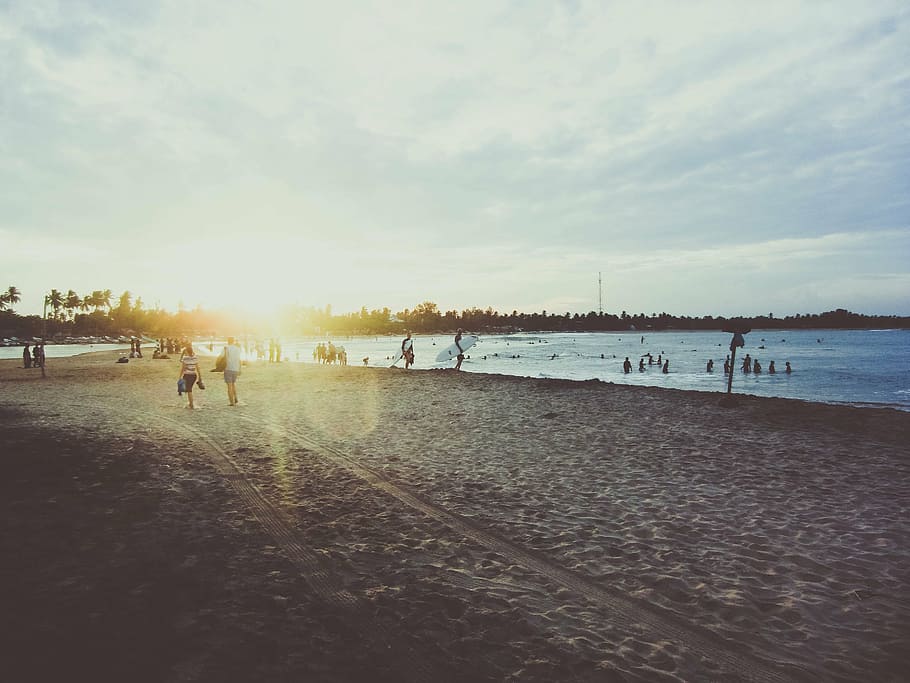 beach, ocean, people, sand, seaside, shore, sunrise, sunset HD wallpaper