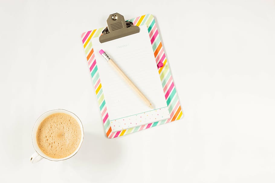 top-view photograph of clipboard, pencil, and cup filled with liquid, HD wallpaper