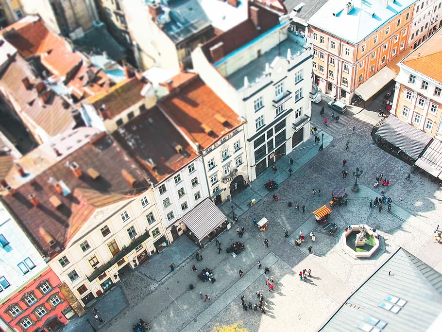 bird's eye view photograph of high-rise building, bird's eye view of people standing near building HD wallpaper