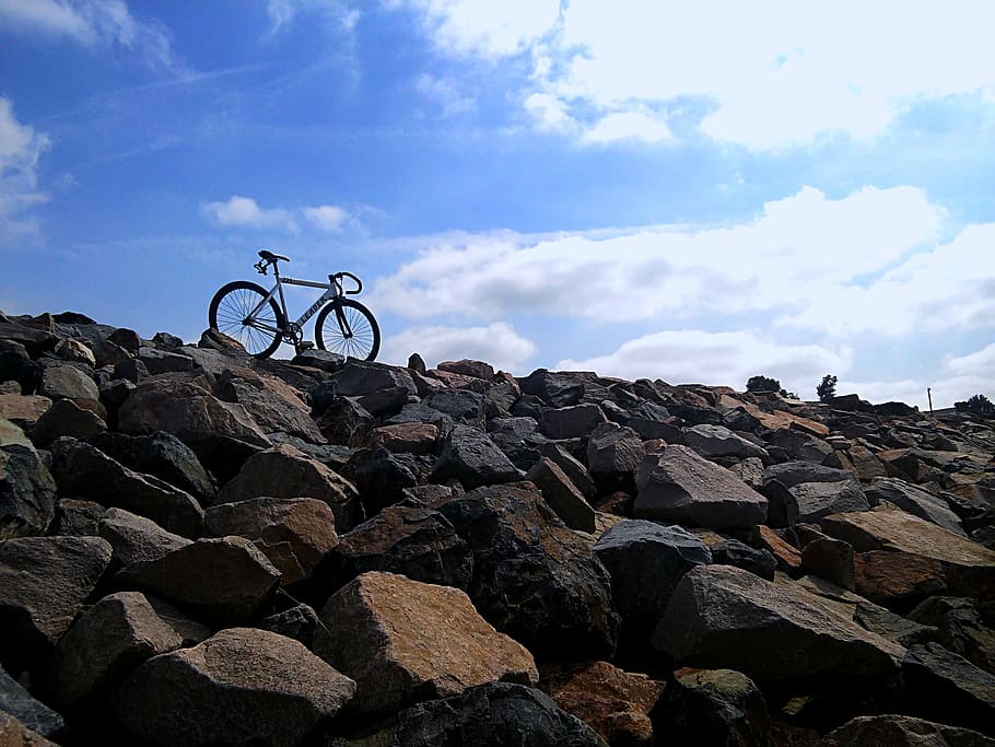 low-angle view of bicycle on rock cliff, bike, sport, healthy, HD wallpaper