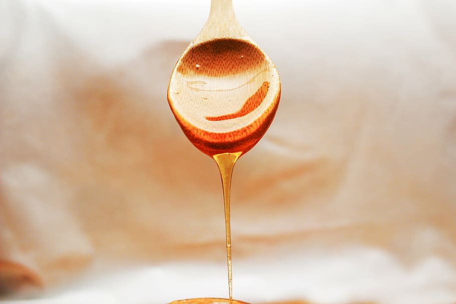 selective photography of dropped honey, flowing, spoon, doré, HD wallpaper