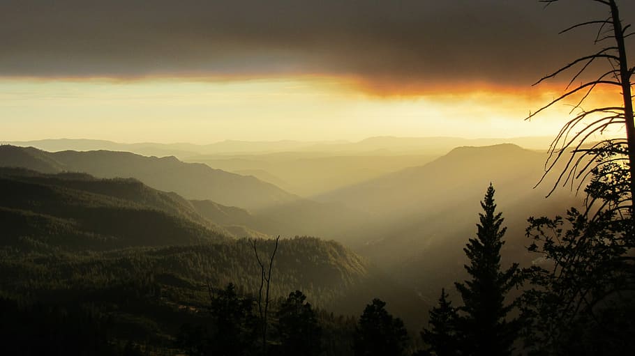 mountains under sunset, foggy mountain, tree, smoke, fire, cloud HD wallpaper