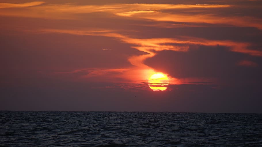 sunset, glowing, orange, red, colorful, clouds, dramatic, yellow HD wallpaper