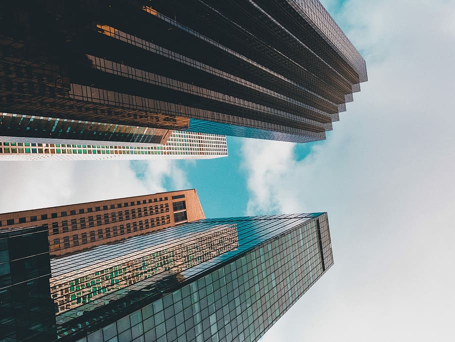 worm eye view of buildings, low-angle photography of two high-rise buildings HD wallpaper