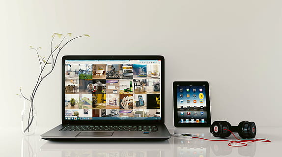 black laptop computer with corded headphones, tab, workstation HD wallpaper