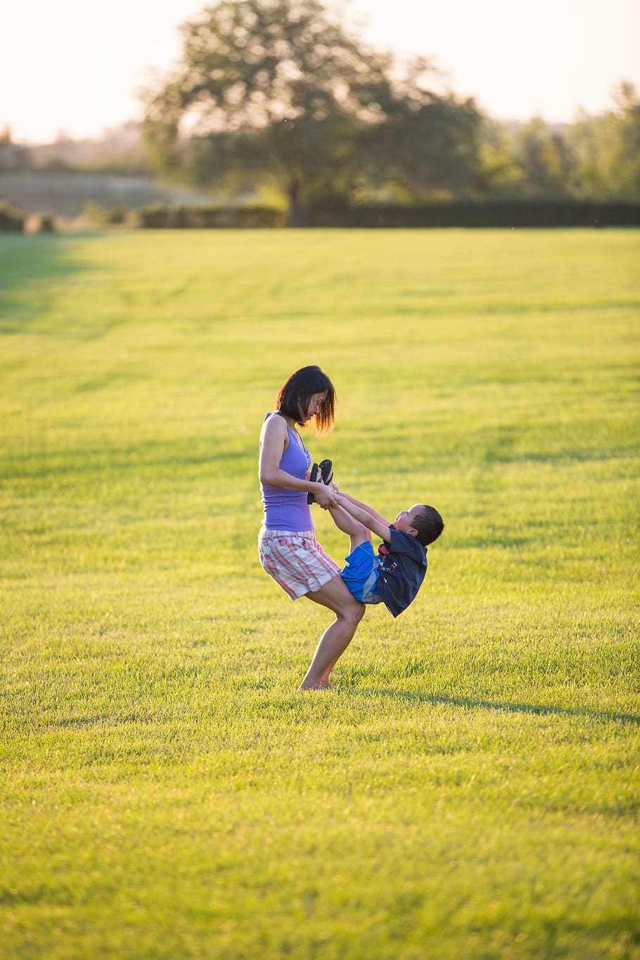 woman playing with boy on grass field, child, happy, fun, young HD wallpaper