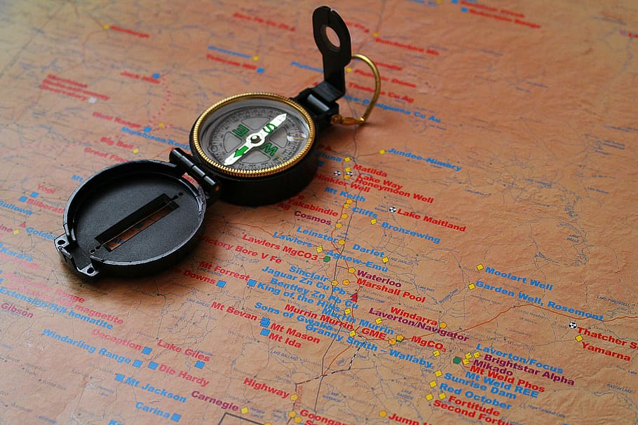 round black compass on map, navigation, gold card, direction HD wallpaper