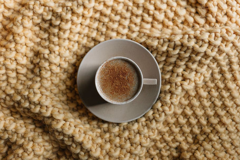 gray ceramic mug on saucer, flat-lay photography of cup of coffee HD wallpaper