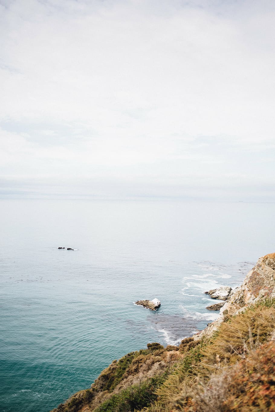 shore, ocean, mountain, rock, coast, water, nature, sea, sky HD wallpaper