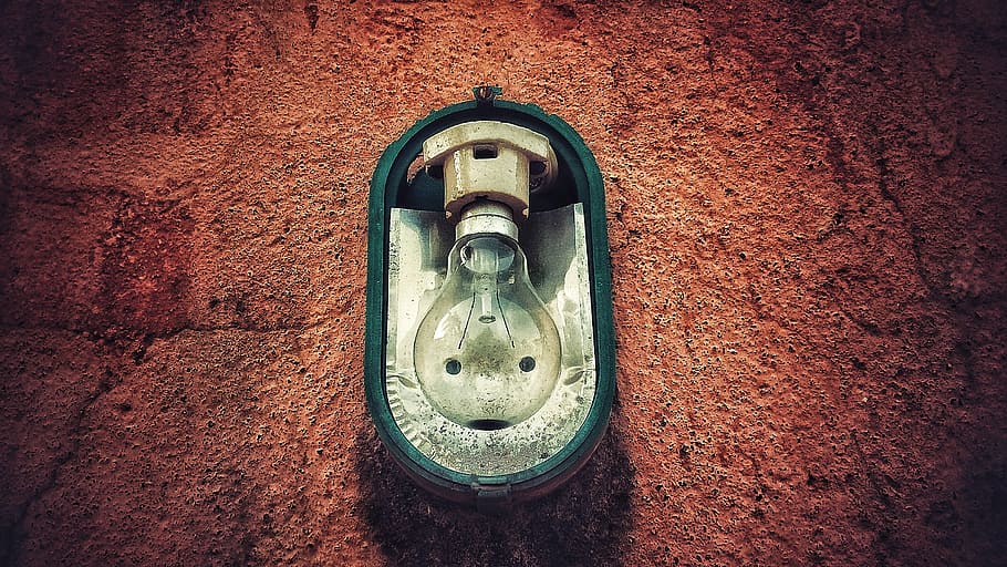 green framed clear bulb lamp on brown concrete wall, light bulb HD wallpaper