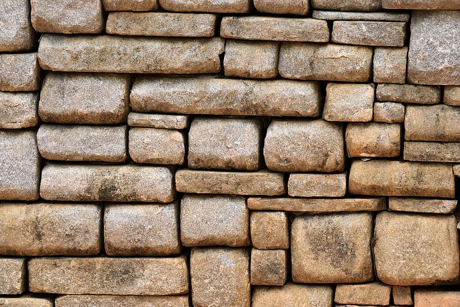 close view of brown brick wall, old, stone wall, background, backdrop