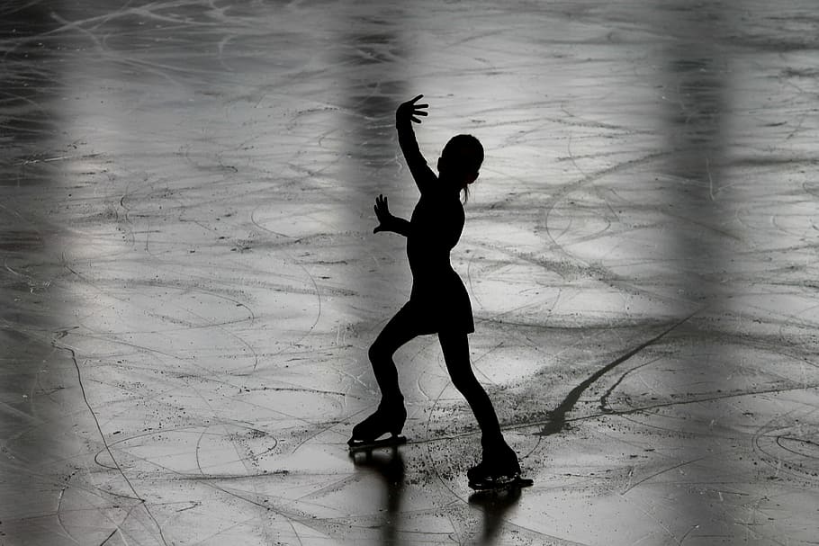 grayscale photograph of ice skier, figure skating, runner, figure skater