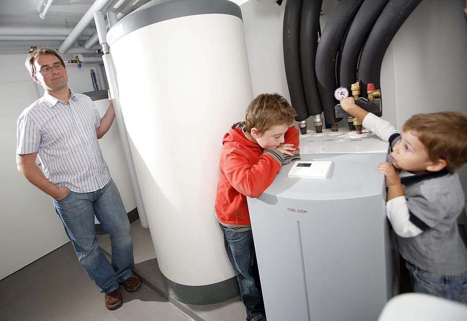 two boys standing between white water heater tank, heat pumps, HD wallpaper