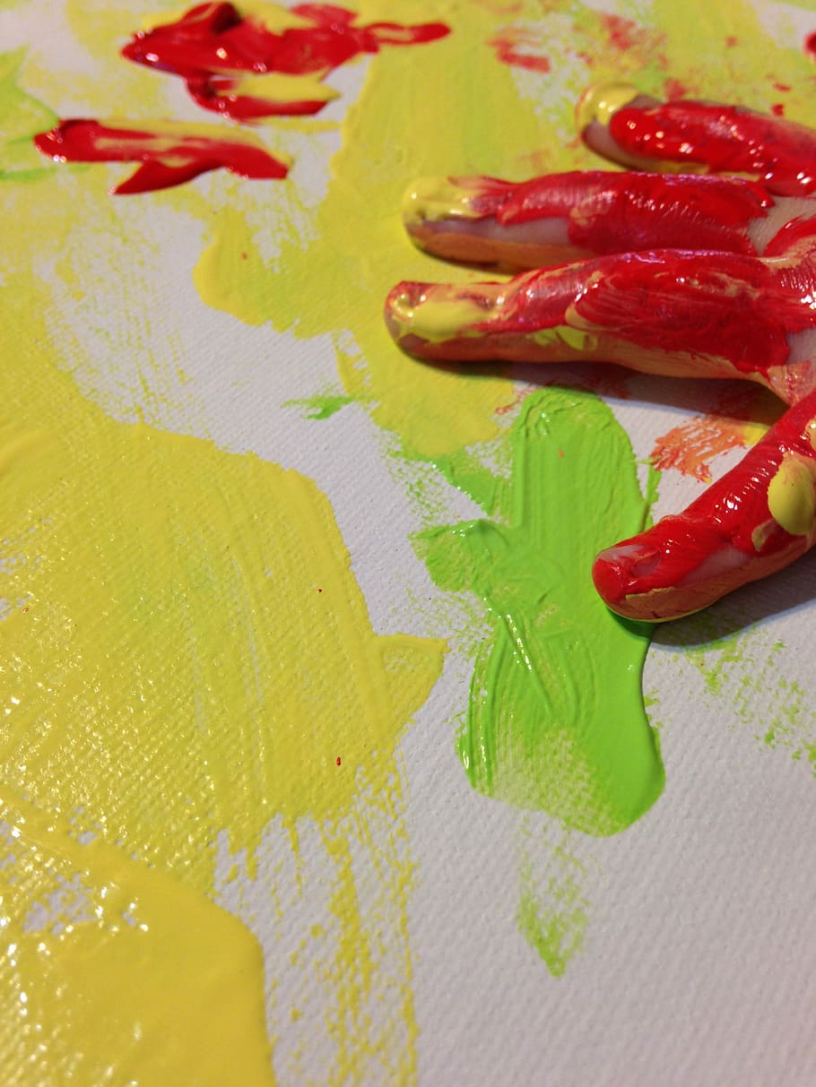 yellow and green paint on canvass and red paint on person's hand, HD wallpaper