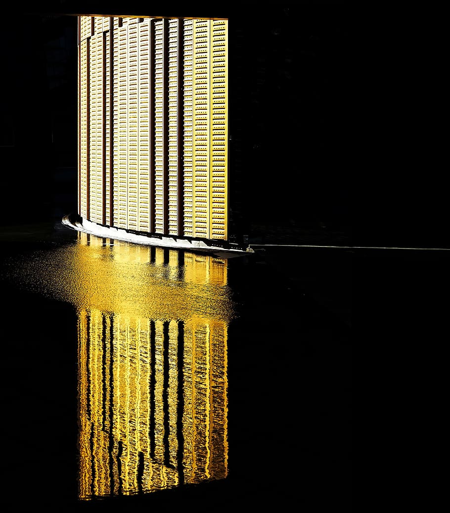 The reflection of a brightly lit wall on the water surface at Fiera Milano Rho P5., untitled HD wallpaper