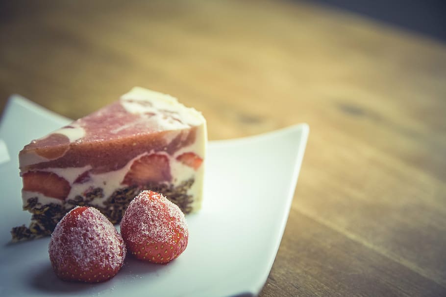 selective focus photography of sliced pie beside strawberries on square white ceramic plate HD wallpaper
