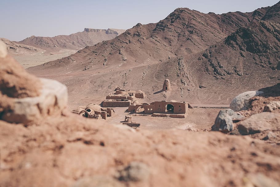 Zoroastrian town in Yazd Province, Iran., stone ruins near mountains HD wallpaper