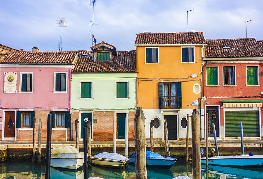assorted-color concrete house, colourful houses, homes, boats