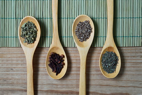 four wooden laddles with different seeds, table, spoon, spice HD wallpaper