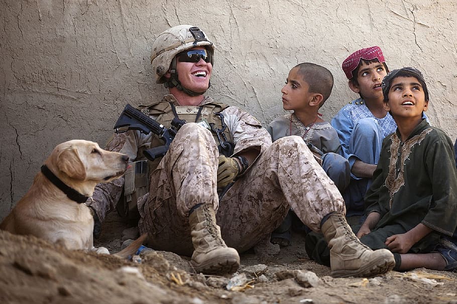 soldier sitting beside three children and adult yellow Labrador retriever, HD wallpaper