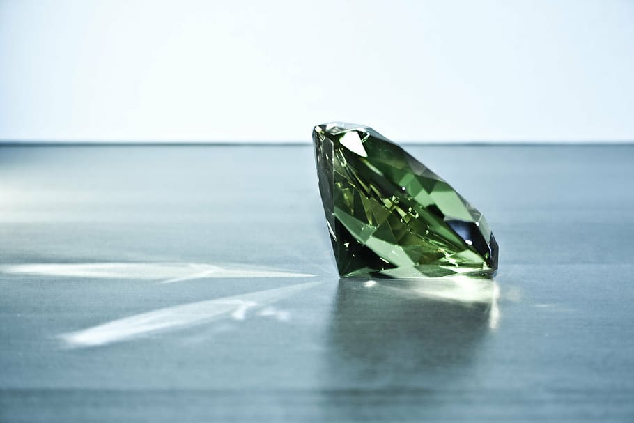 HD wallpaper: green gemstone on black surface, diamond, glass stone, grey,  refraction | Wallpaper Flare